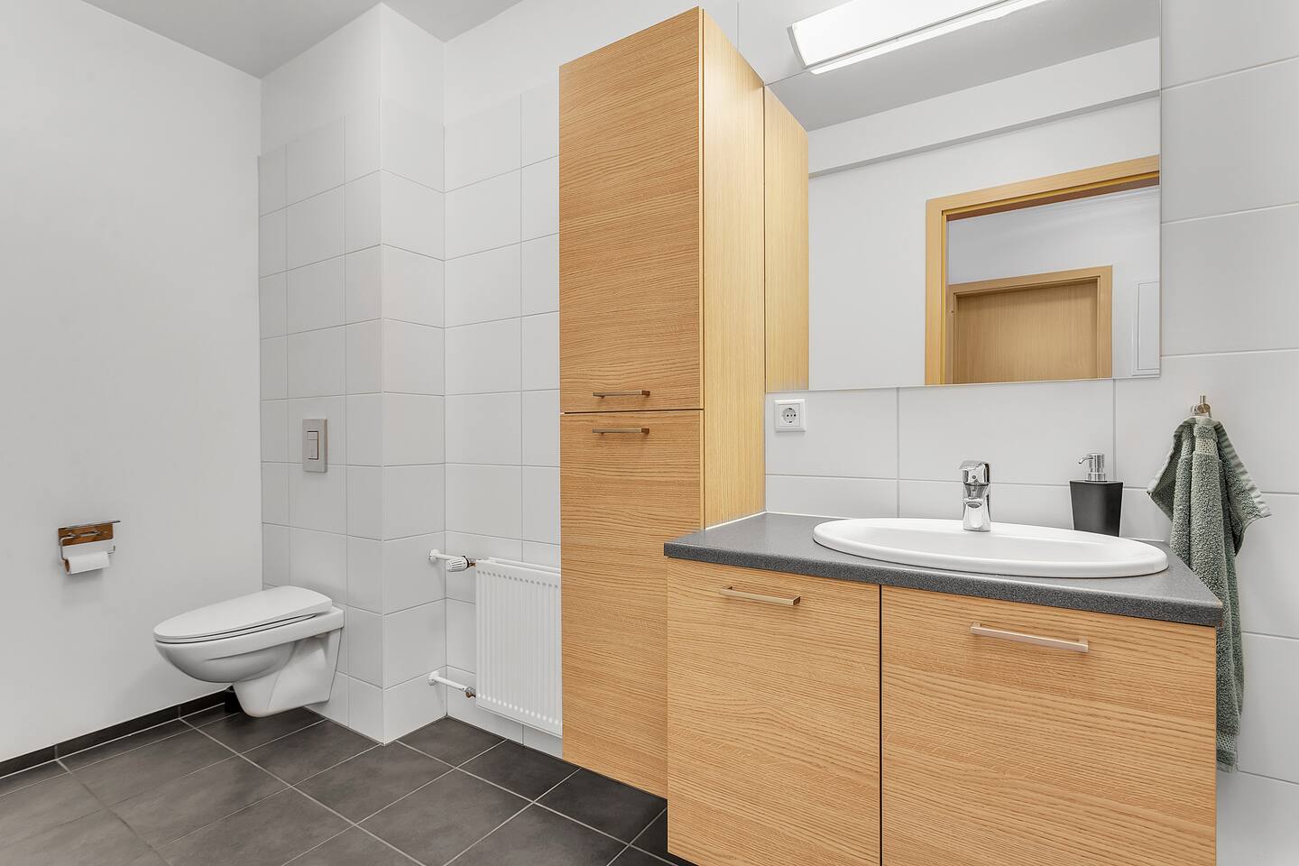 Bathroom with sink and cabinet