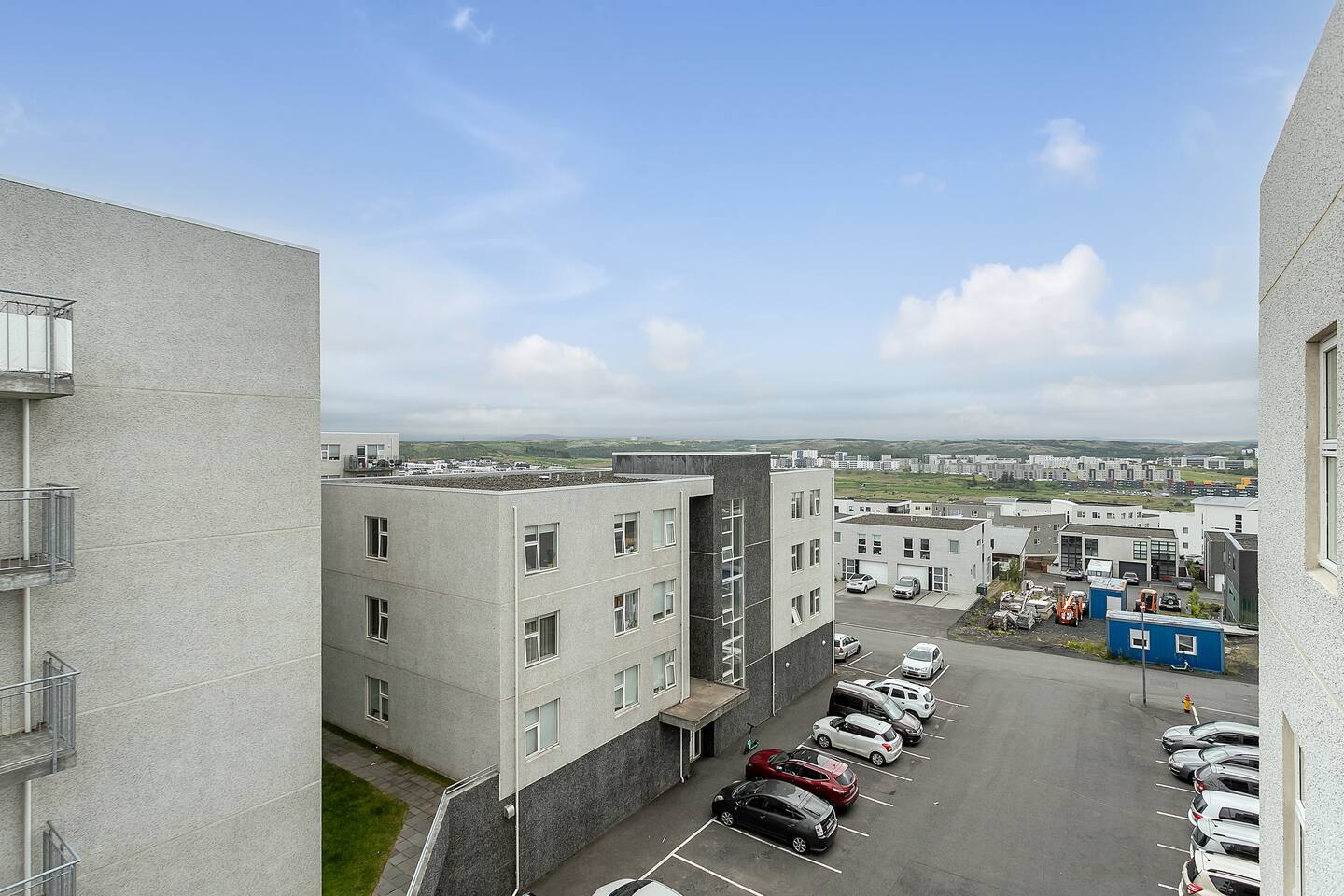 Another view of the apartment building and street